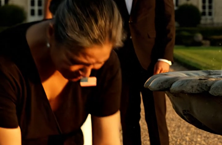 At my daughter’s wedding, I gave her an old passbook. My daughter threw it into the fountain and said, “Is this just a few loose bills, mom?” Her wealthy husband smirked and added, “Your mom’s just a cleaner anyway.” I walked out. The next morning, I went to the bank. The teller went pale and said, “Ma’am… do not leave.”